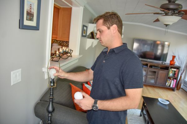 Man changing a lightbulb